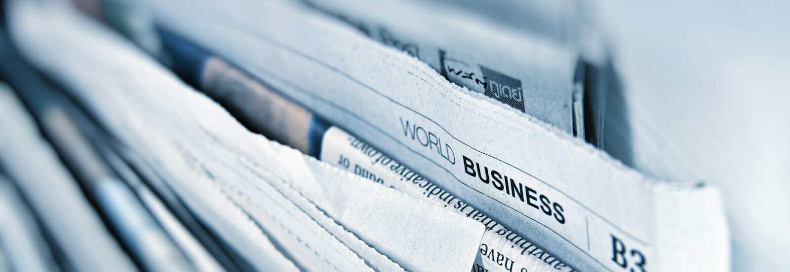 Photo by AbsolutVision Business newspaper article